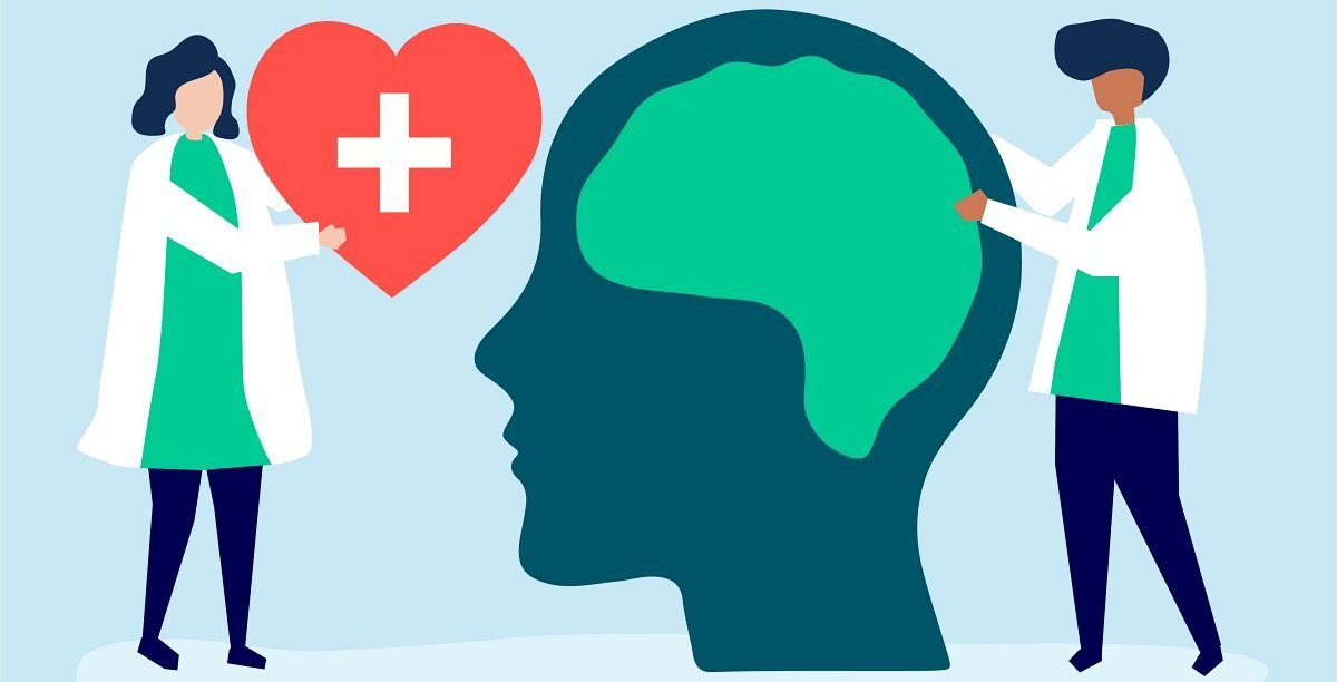 Neuroscientists with a giant chart of human brain and a heart icon